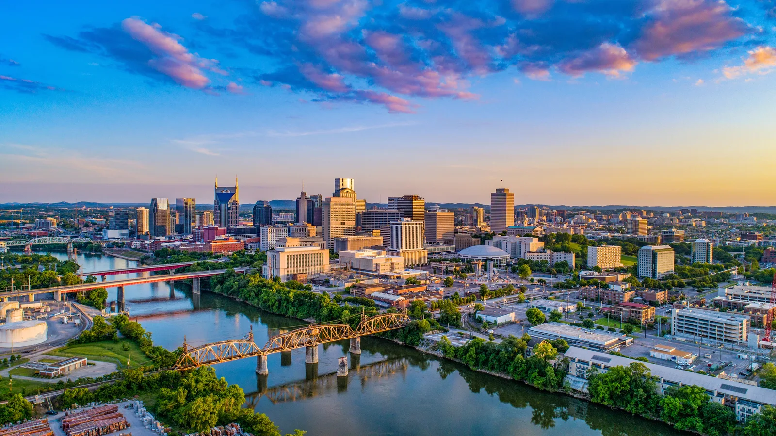 Aerial view of the downtown Nashville skyline along the Cumberland River.
